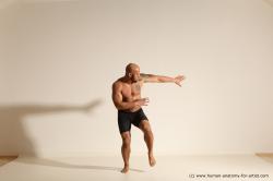 Underwear Gymnastic poses Man Black Muscular Bald Dancing Dynamic poses Academic